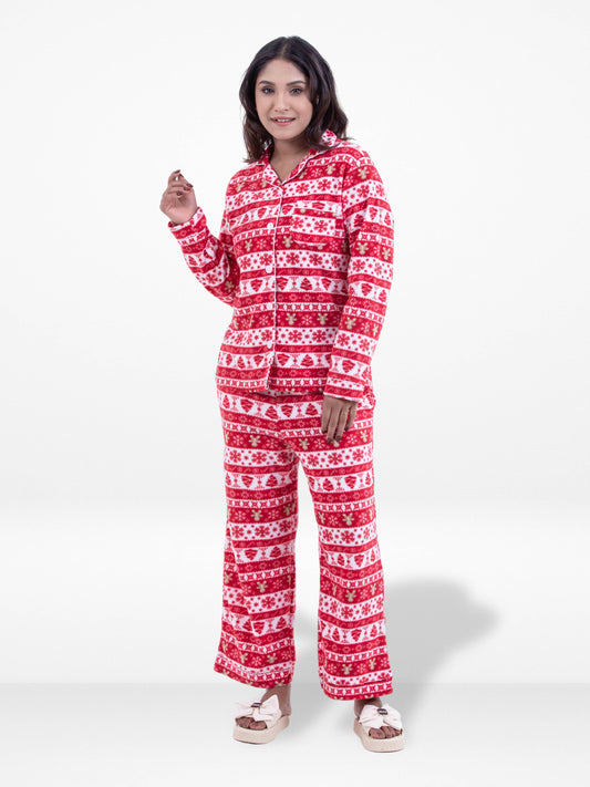 Woman wearing a red and white patterned onesie on a white background